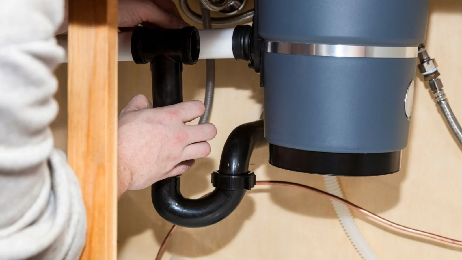 How to Unstick a Garbage Disposal Safely and Effectively